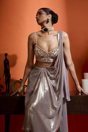 Metallic Silver Drape Saree Coupled With A Beaded Blouse