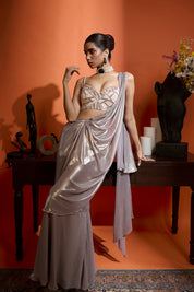 Metallic Silver Drape Saree Coupled With A Beaded Blouse