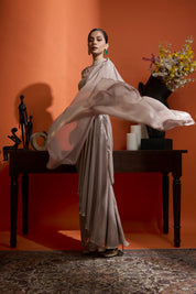 Champagne Gold Drape Saree Coupled With A Beaded Blouse