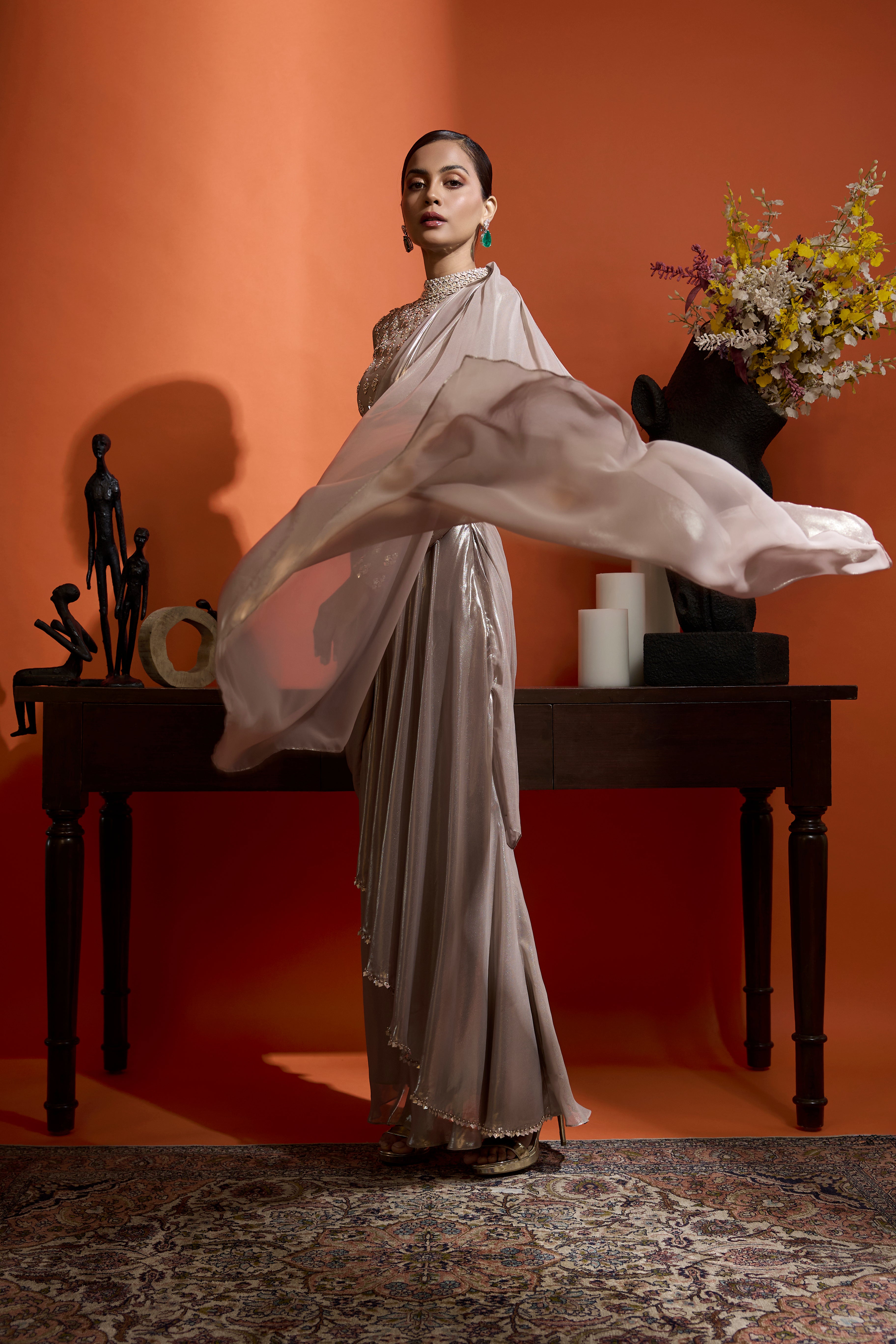 Champagne Gold Drape Saree Coupled With A Beaded Blouse