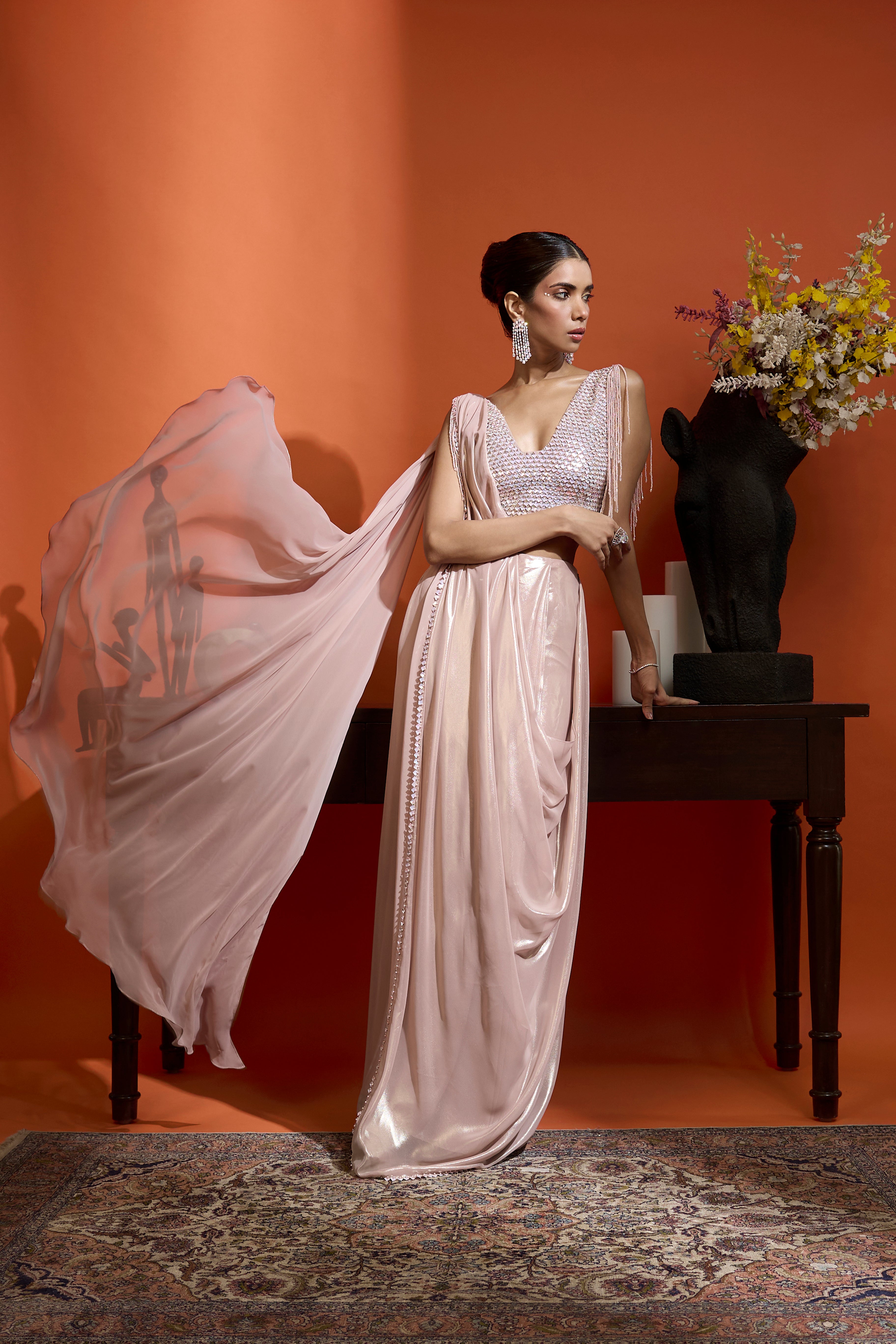 Metallic Blush Drape Saree Coupled With An Embellished Blouse