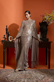 Cape Style Ensemble Paired With A Drape Skirt