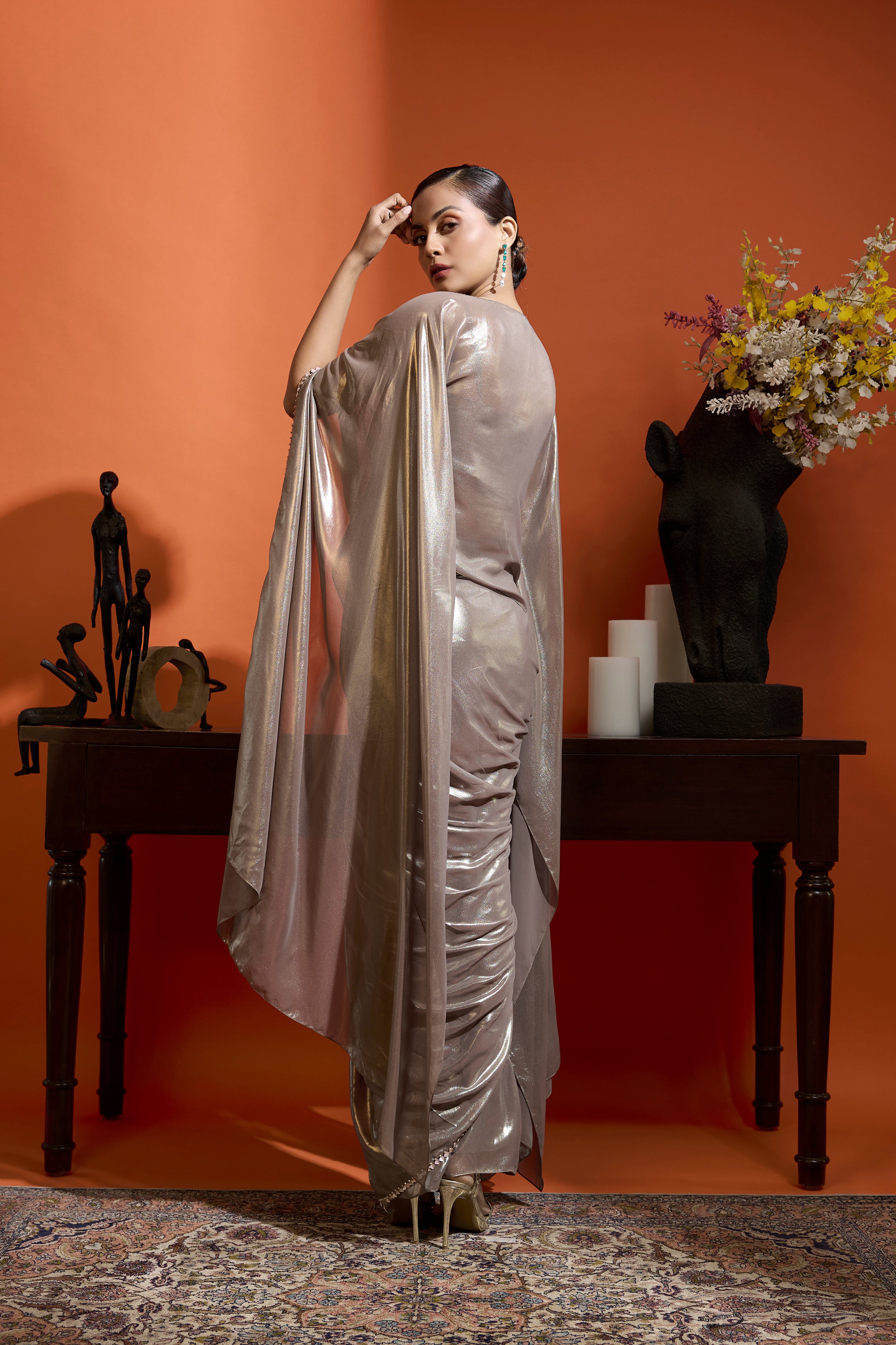 Cape Style Ensemble Paired With A Drape Skirt