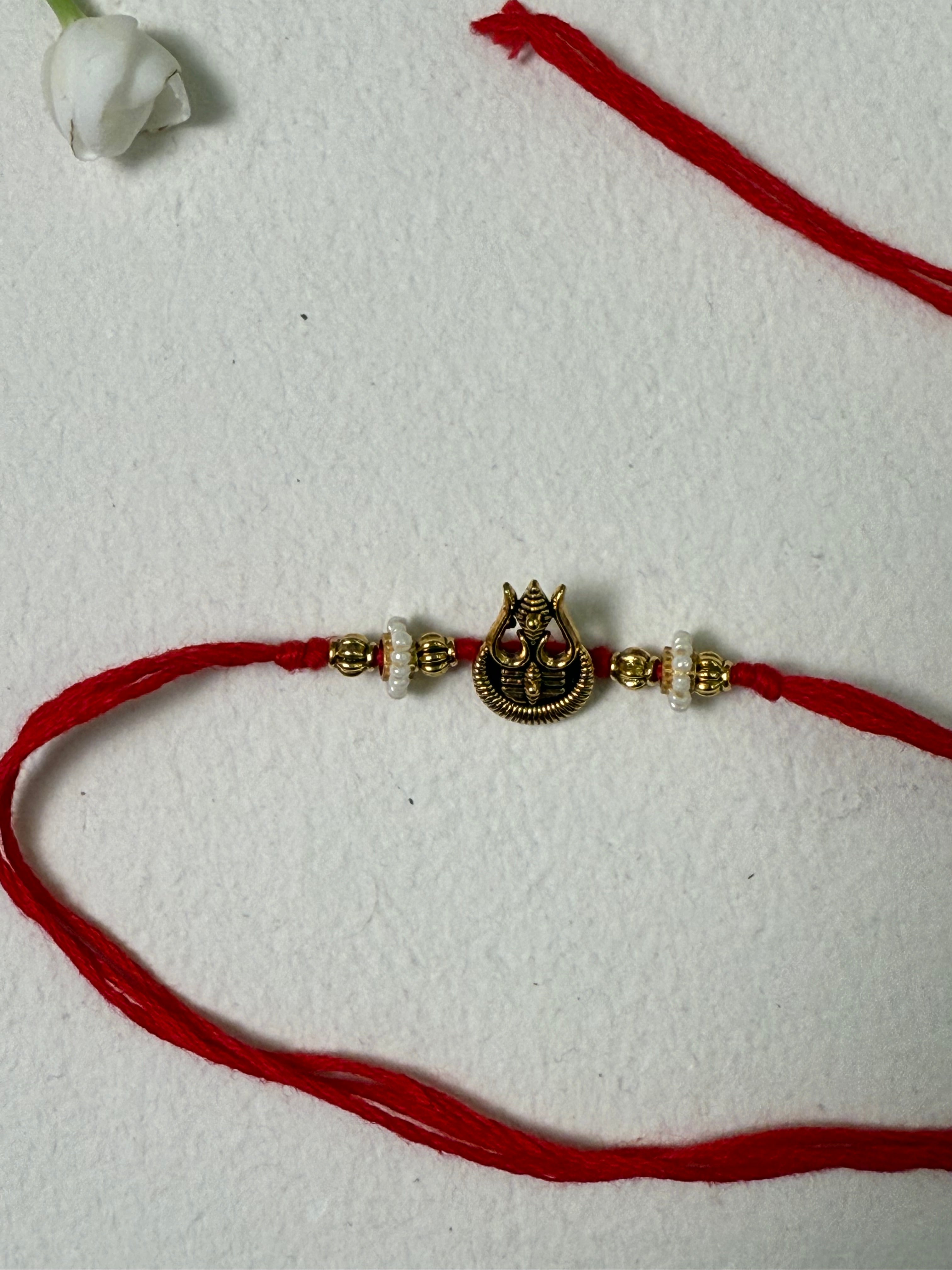 Trinetra Rakhi & Bracelet Set Of Two