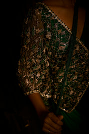 Emerald Green Draped Saree Paired with Embroidered Tulle Cape
