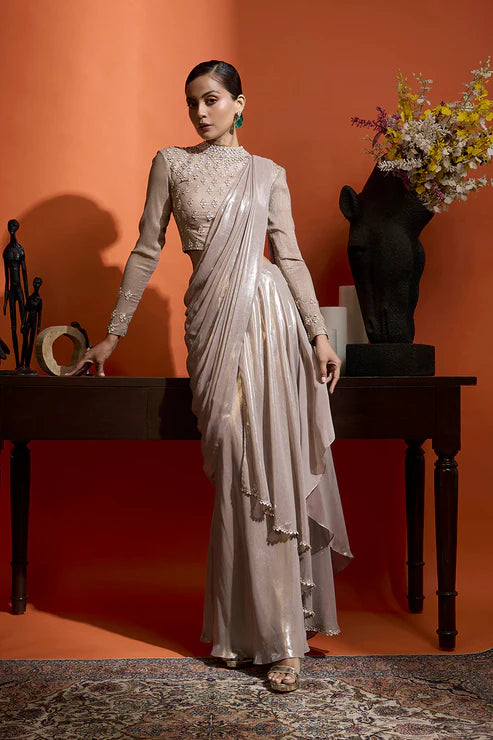 Champagne Gold Drape Saree Coupled With A Beaded Blouse