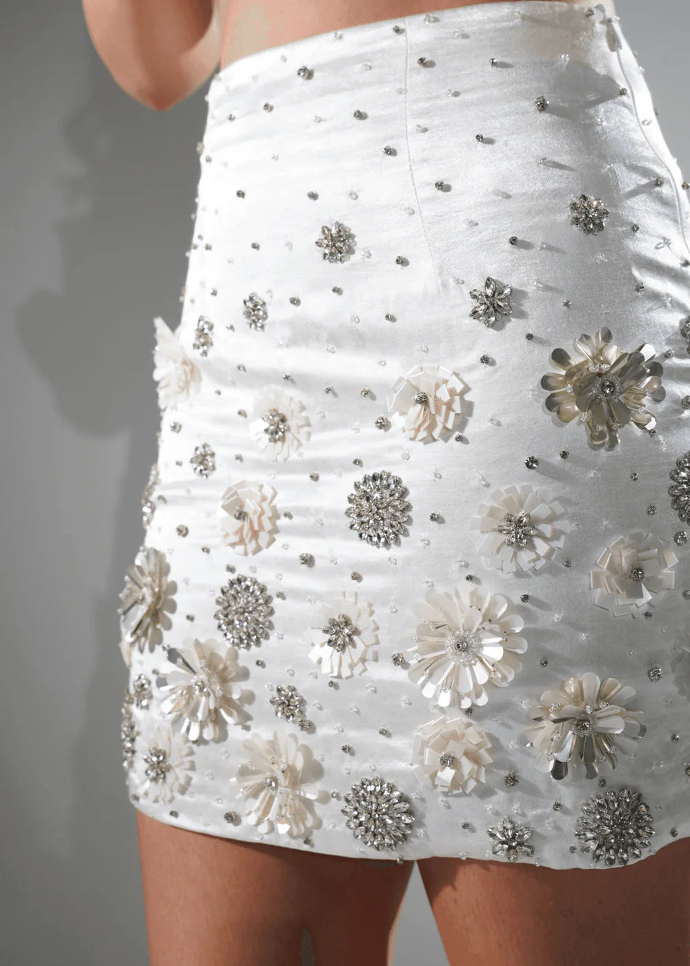 CHARLOTTEWHITEFLORALSEQUINEMBELLISHEDMINISKIRT4.webp