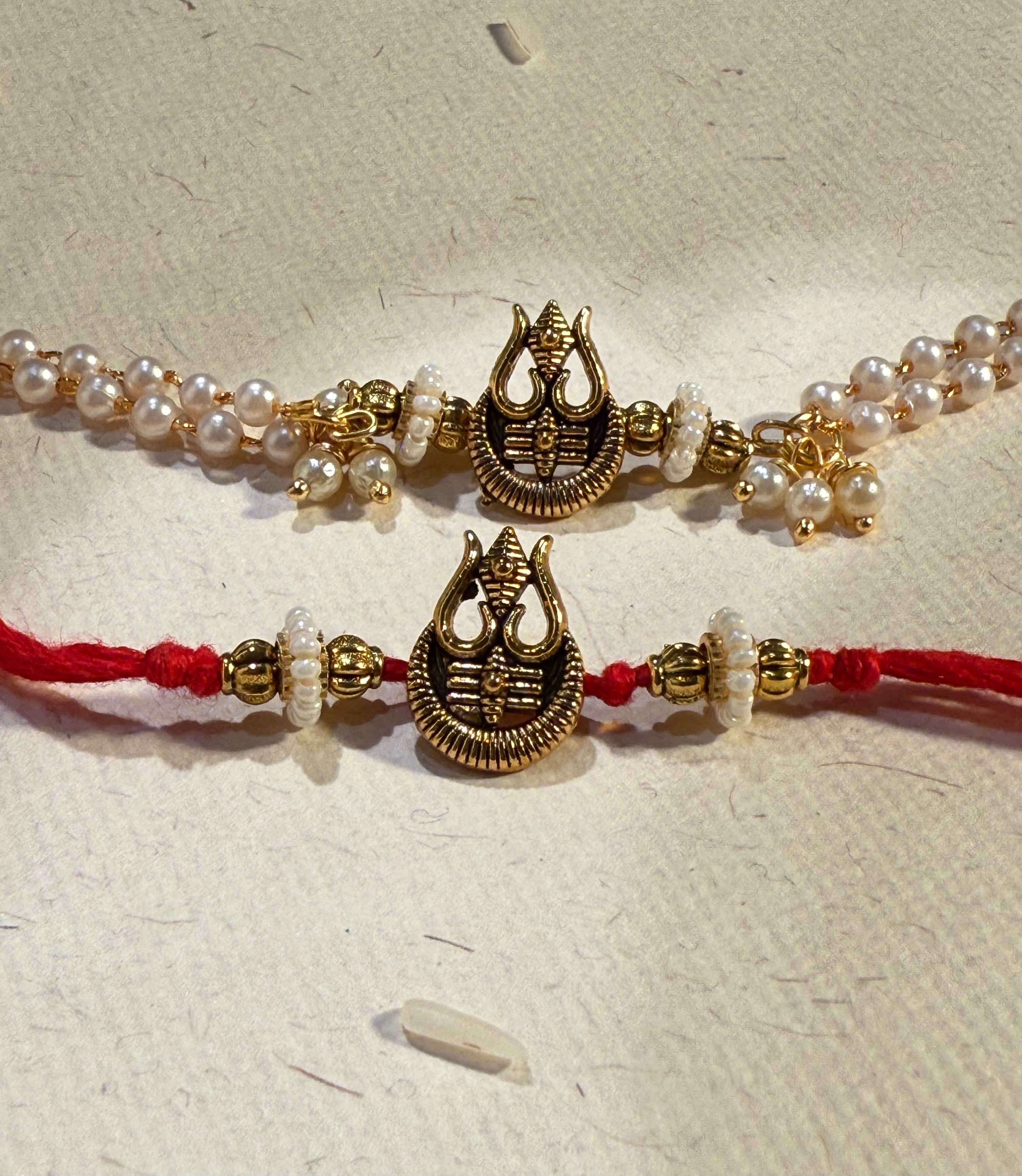 Trinetra Rakhi & Bracelet Set Of Two
