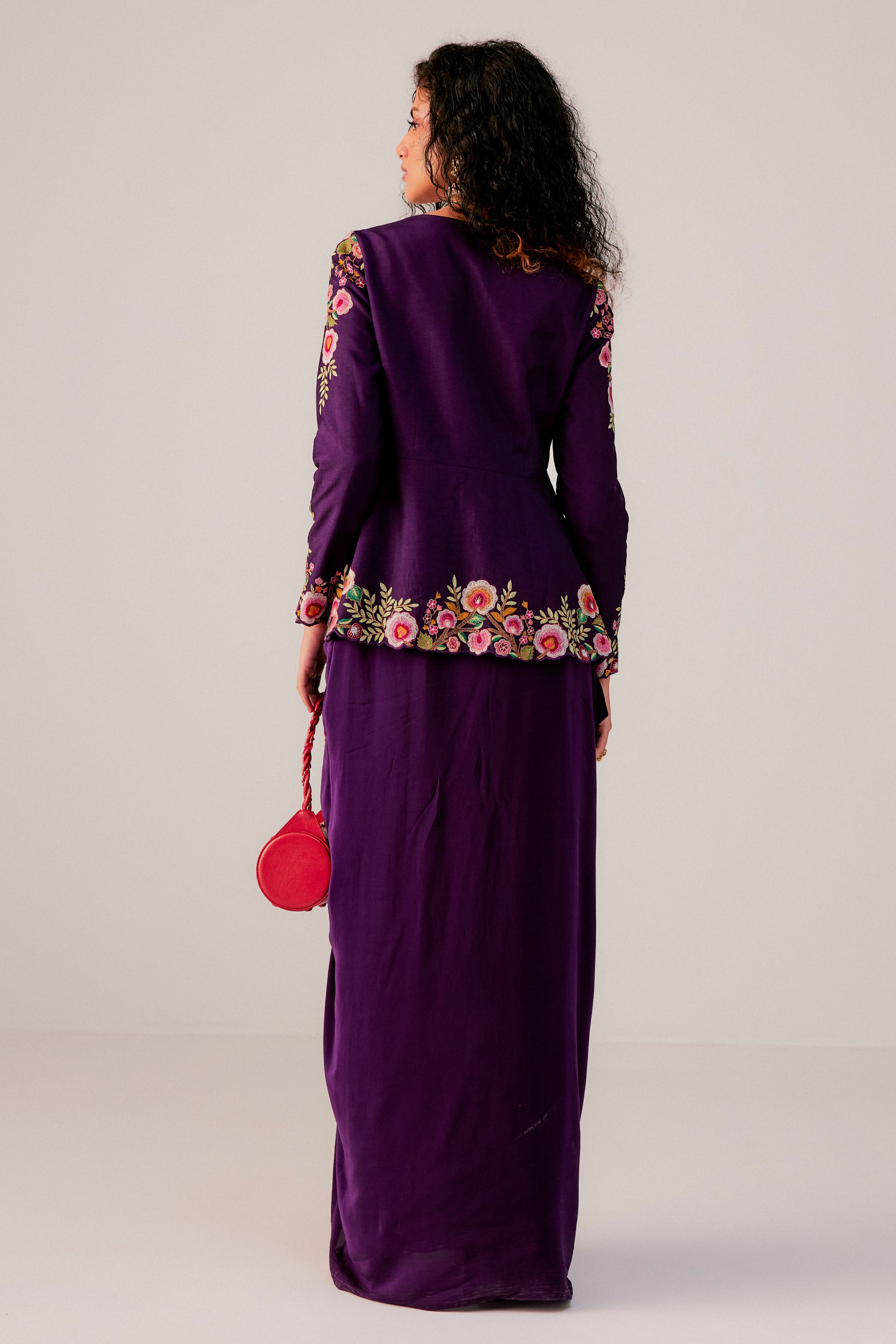 Peplum Top Paired Up With A Drape Skirt