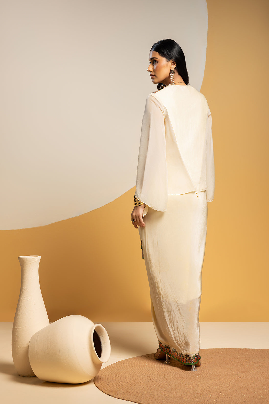 Taarani Off White Embellished V Neck Drape Skirt Set
