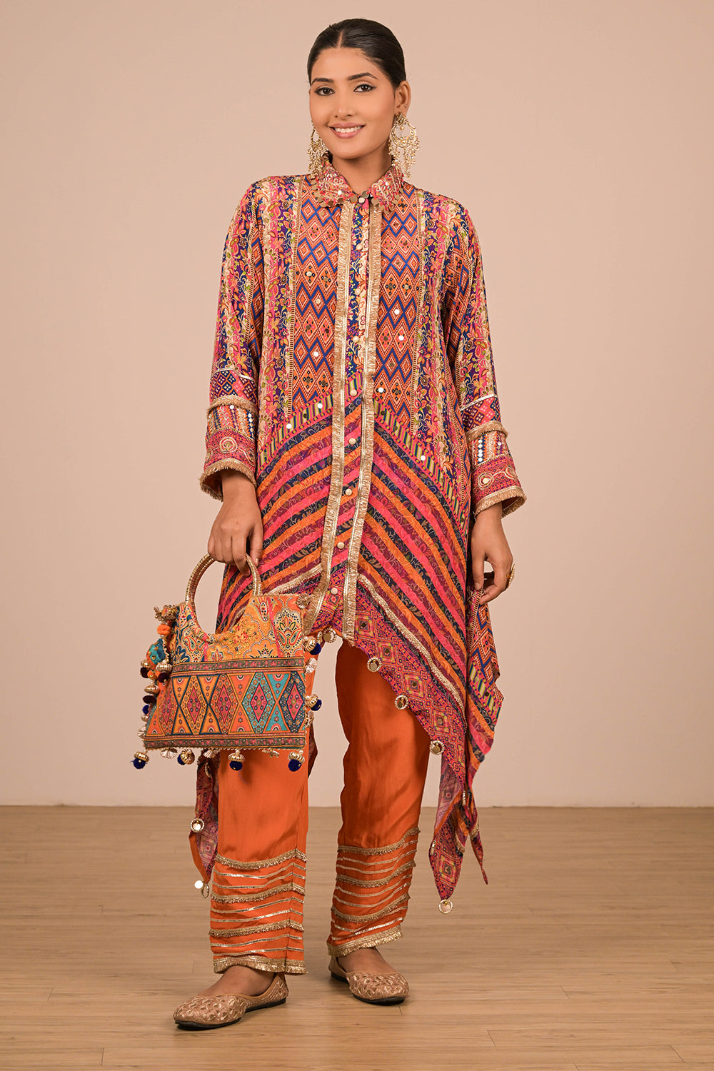 Asymmetrical Orange Kurta Set With Bag