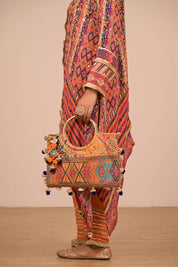 Asymmetrical Orange Kurta Set With Bag