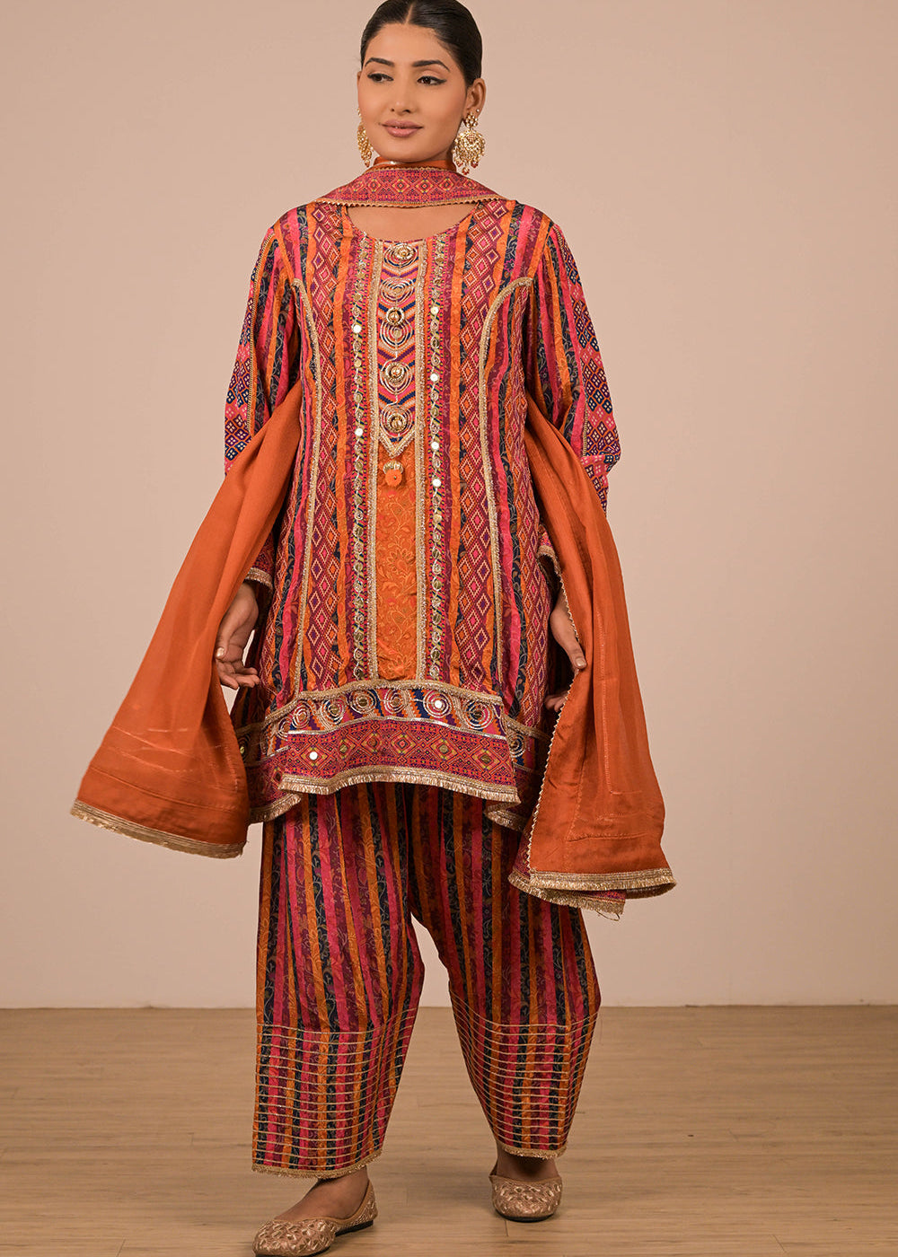 ishum_orange-crepe-suit-set-with-farsi-salwar-with-canvas-tote-bag-1.jpg