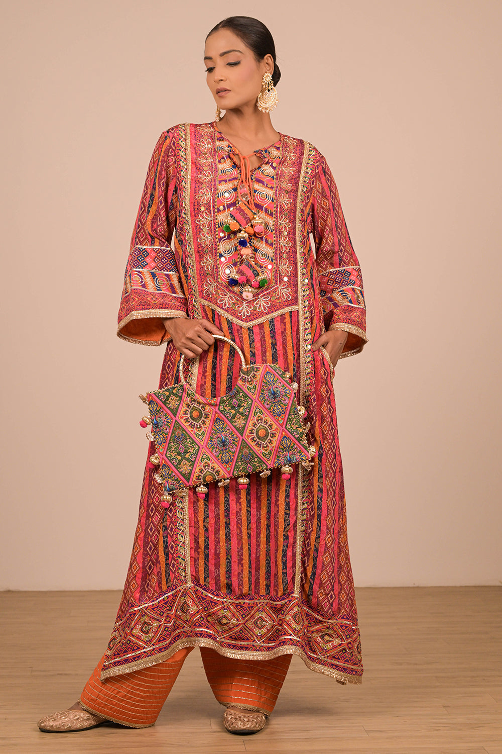 Orange Embroidered A Line Suit with Dupatta And Bag