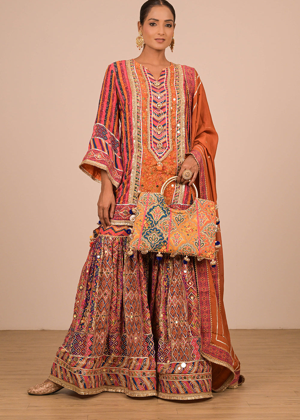 ishum_orange-sharara-suit-in-crepe-fabric-with-canvas-tote-bag-1.jpg