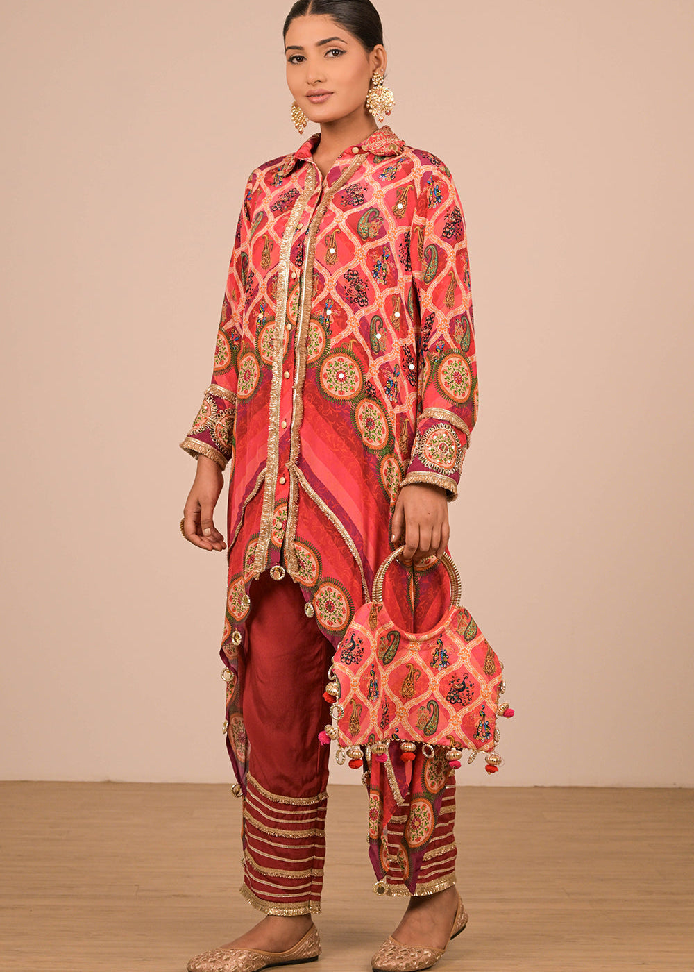 ishum_persian-red-asymmetric-hem-kurta-set-in-crepe-fabric-with-canvas-tote-bag-1.jpg
