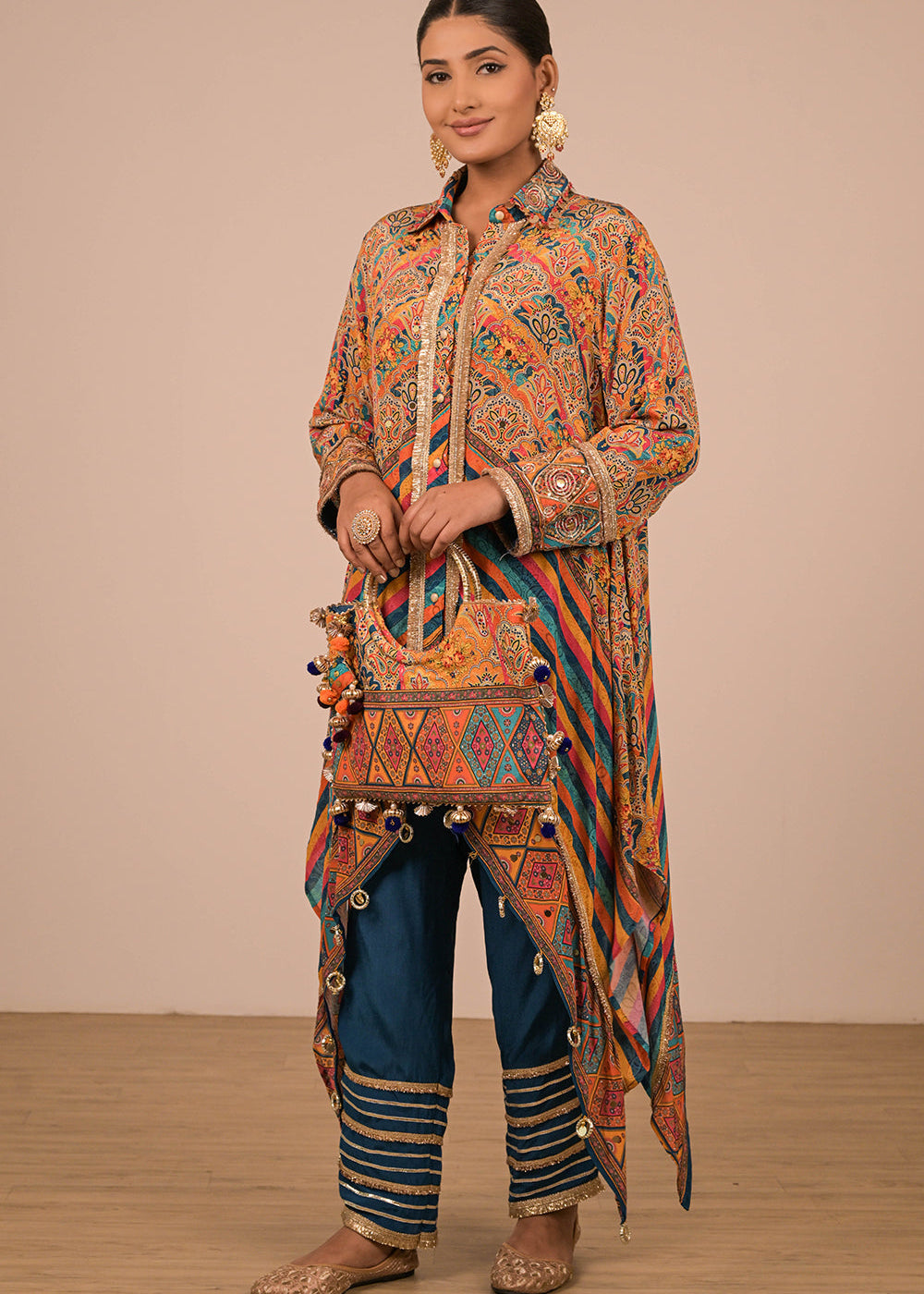 ishum_sapphire-blue-asymmetrical-kurta-set-in-crepe-fabric-with-canvas-tote-bag-1.jpg