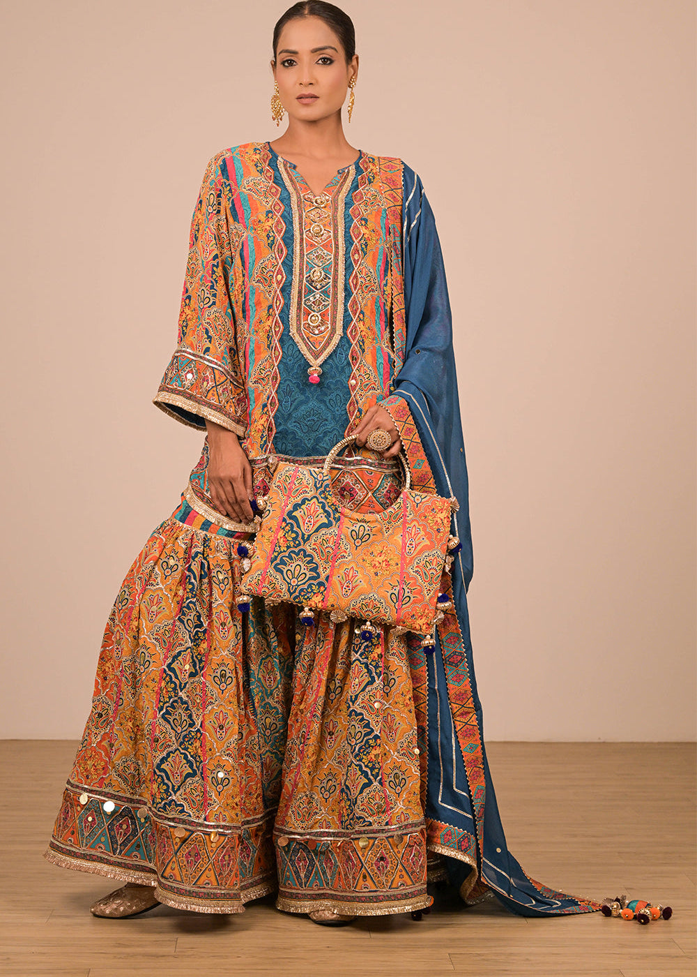 ishum_sapphire-blue-crepe-sharara-set-with-canvas-tote-bag-with-vibrant-print-motifs-1.jpg