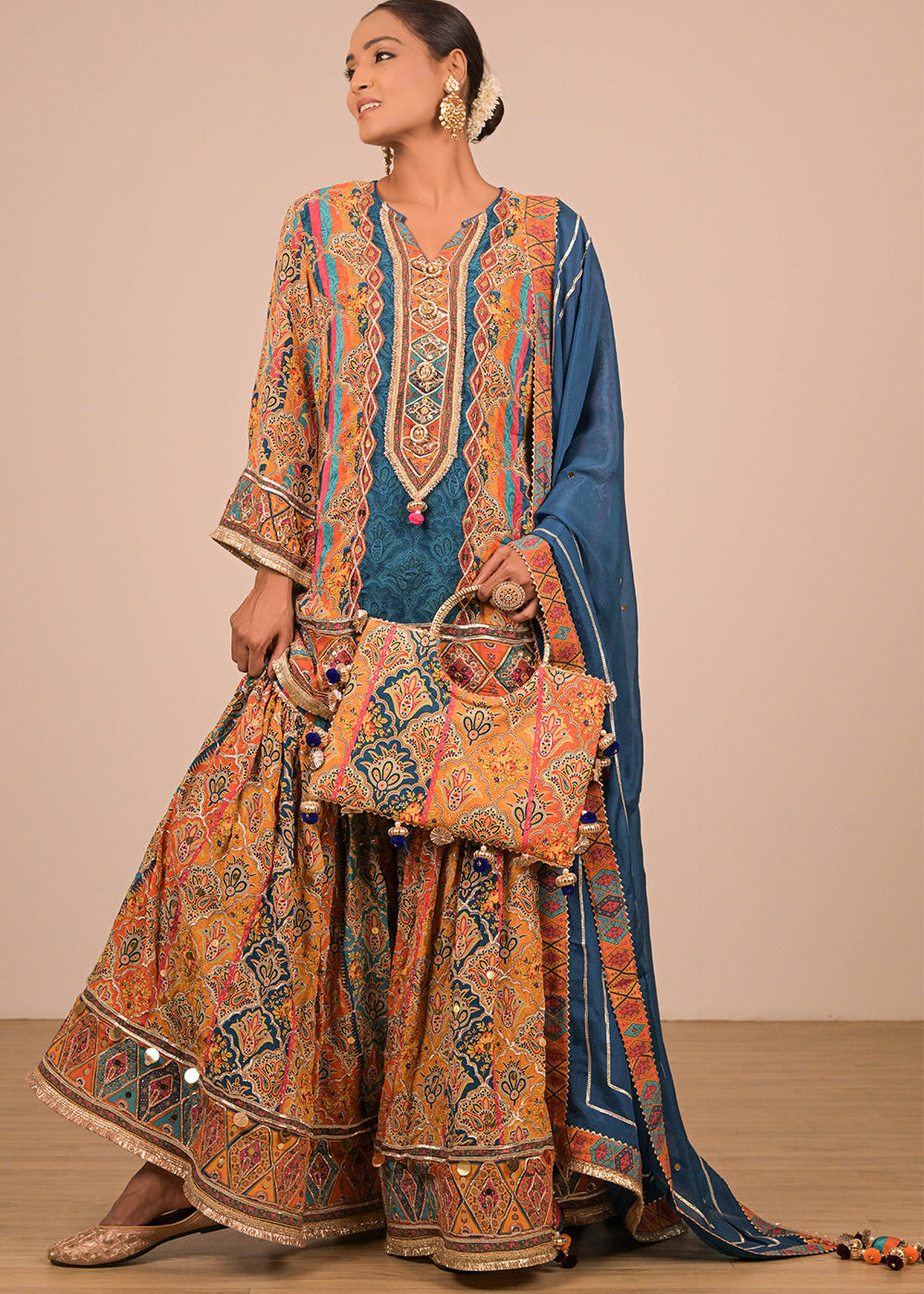 ishum_sapphire-blue-crepe-sharara-set-with-canvas-tote-bag-with-vibrant-print-motifs-2.jpg