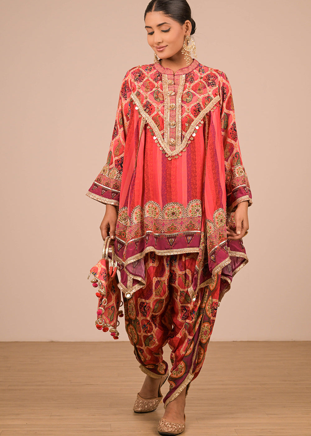 ishum_vibrant-persian-red-crepe-suit-set-with-tulip-pants-and-heavy-embroidered-potli-bag-2.jpg