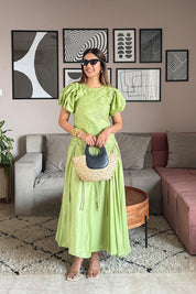 Sneha Adwani in Pleated Midi Dress
